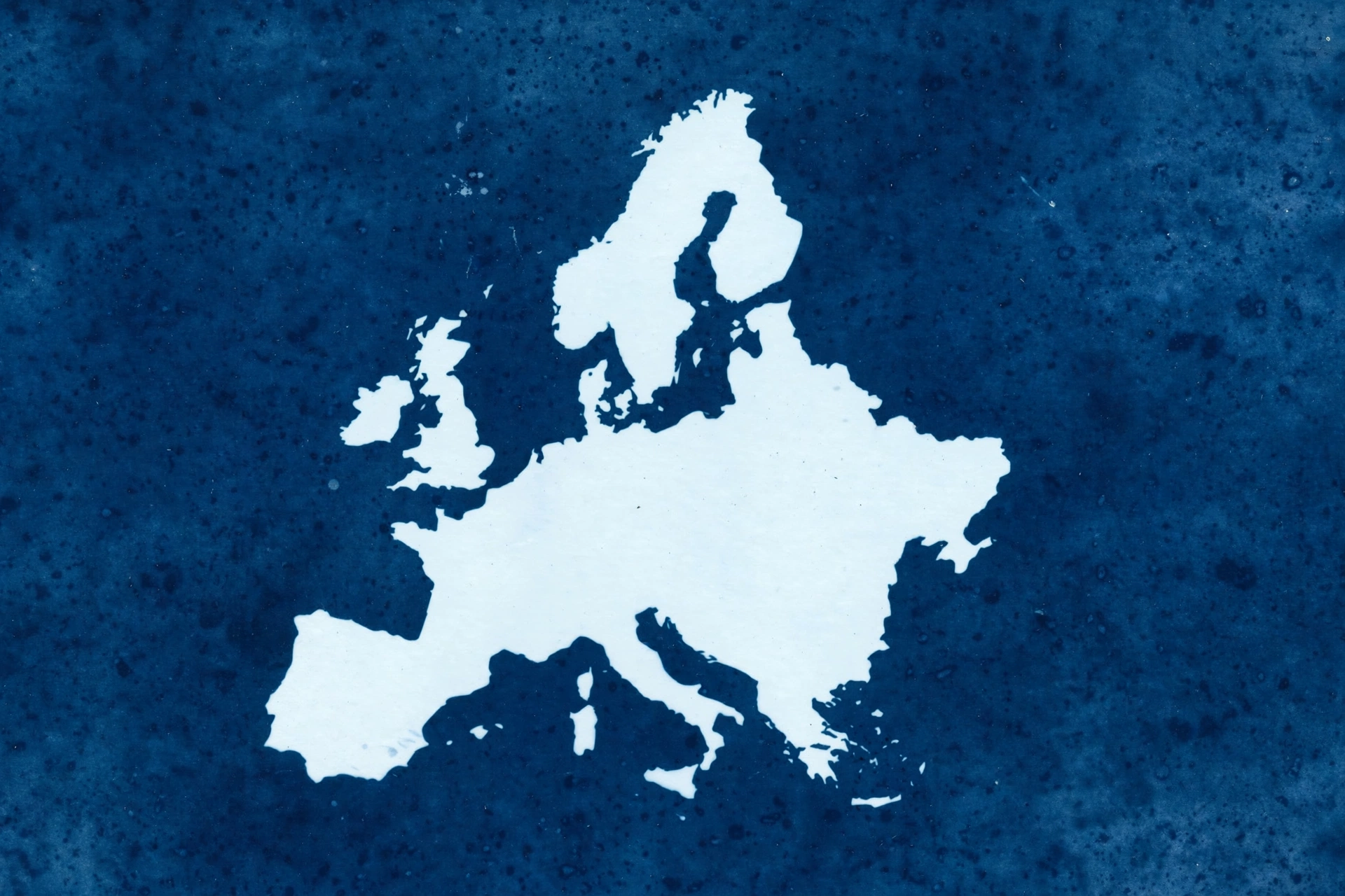 A cyanotype print of a map of Europe with Great Britain, Ireland, and Scandinavia visible.