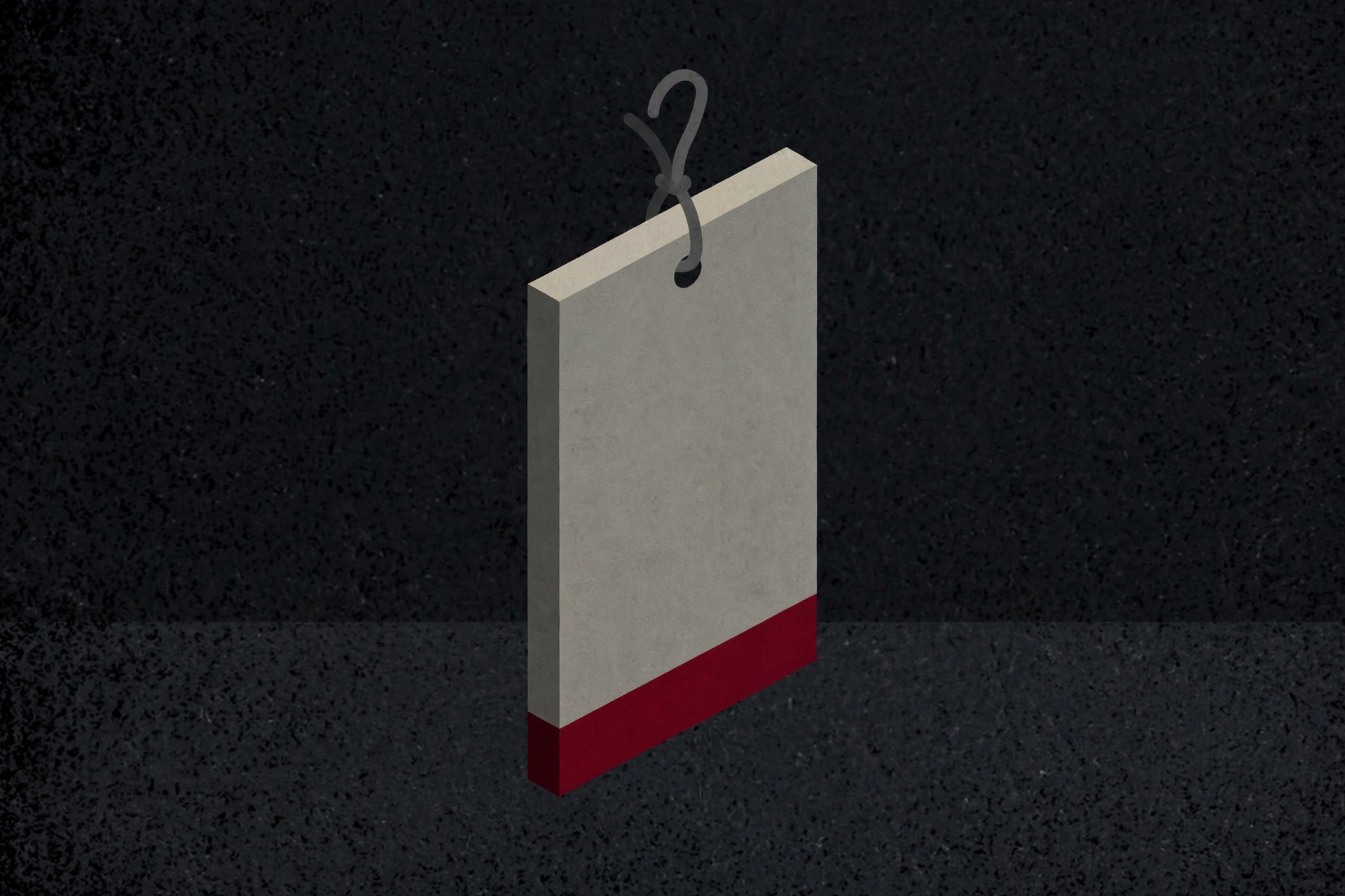 A photograph of a blank rectangular tag hanging from a wire loop against a dark speckled background.